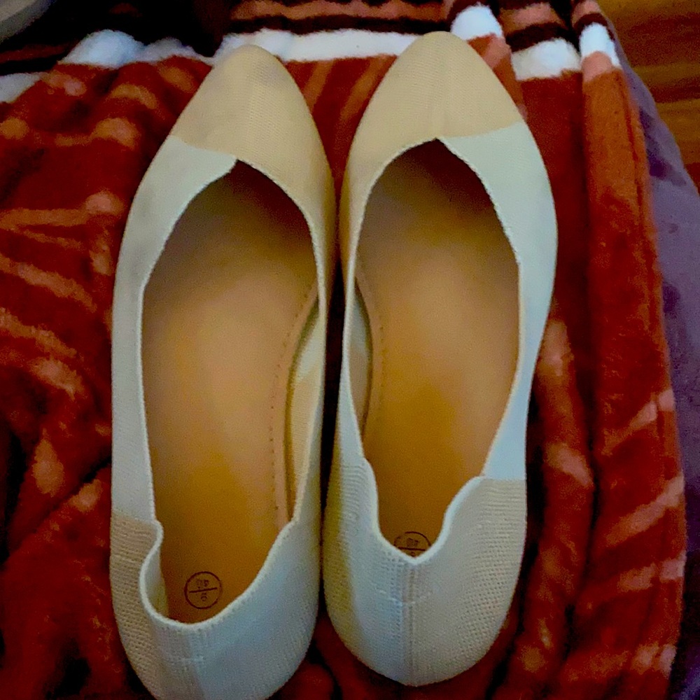 Flat and comfortable shoes—netted with an easy fit.